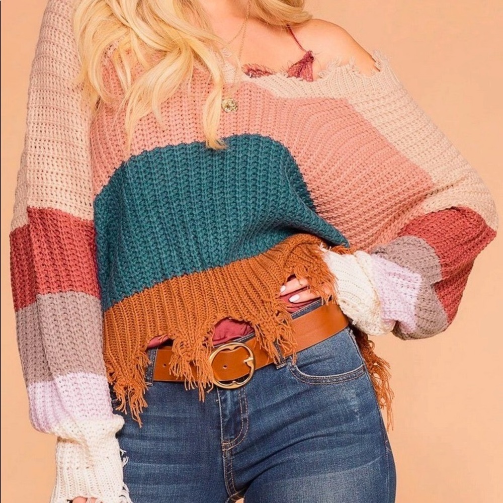 Colorful striped sweater frayed ends.